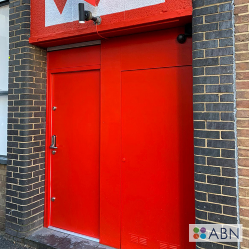 Red steel doors and internal window shutter